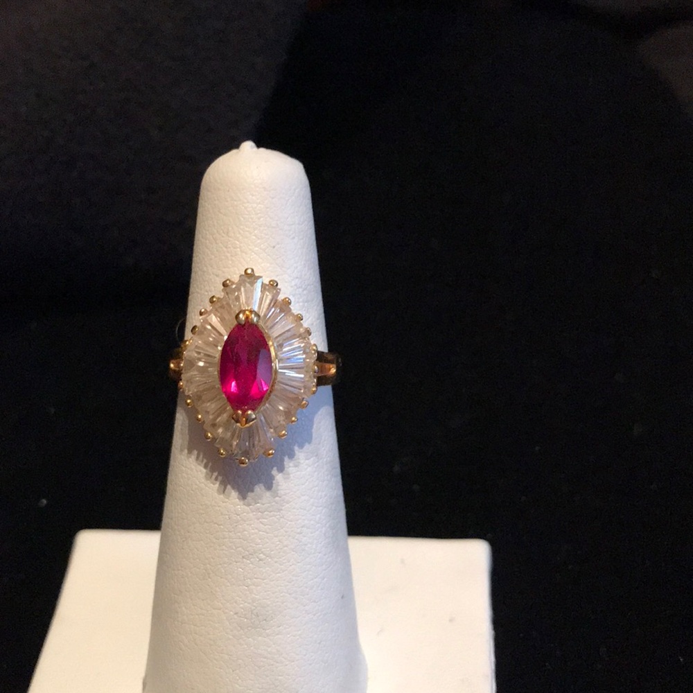 Stunning Simulated ruby & CZ baguette’s ring.